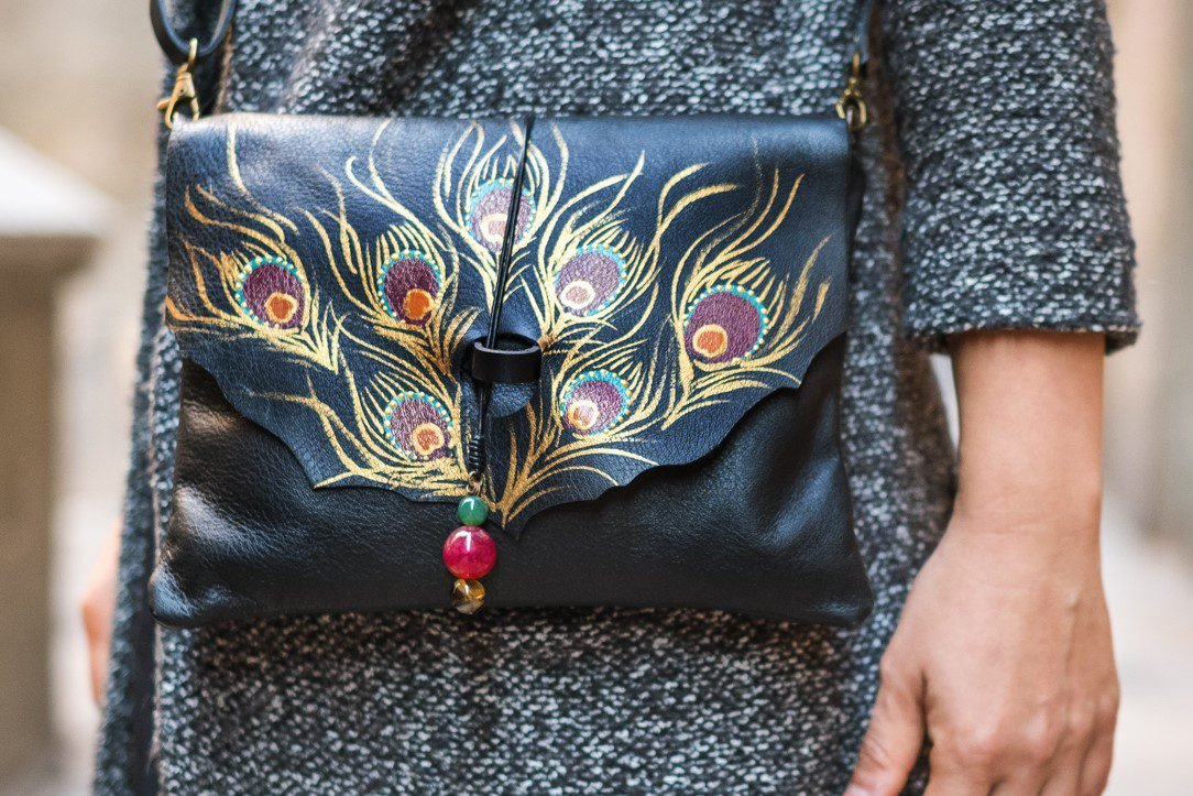 Leather bag painted with peacock feathers Black bag with peacock design