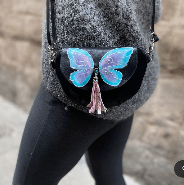 Black rounded bag with butterfly