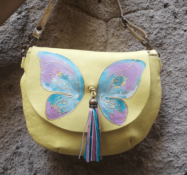 Butterfly painted bag Yellow rounded leather bag with butterfly